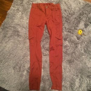 Burnt orange/red skinny jeans